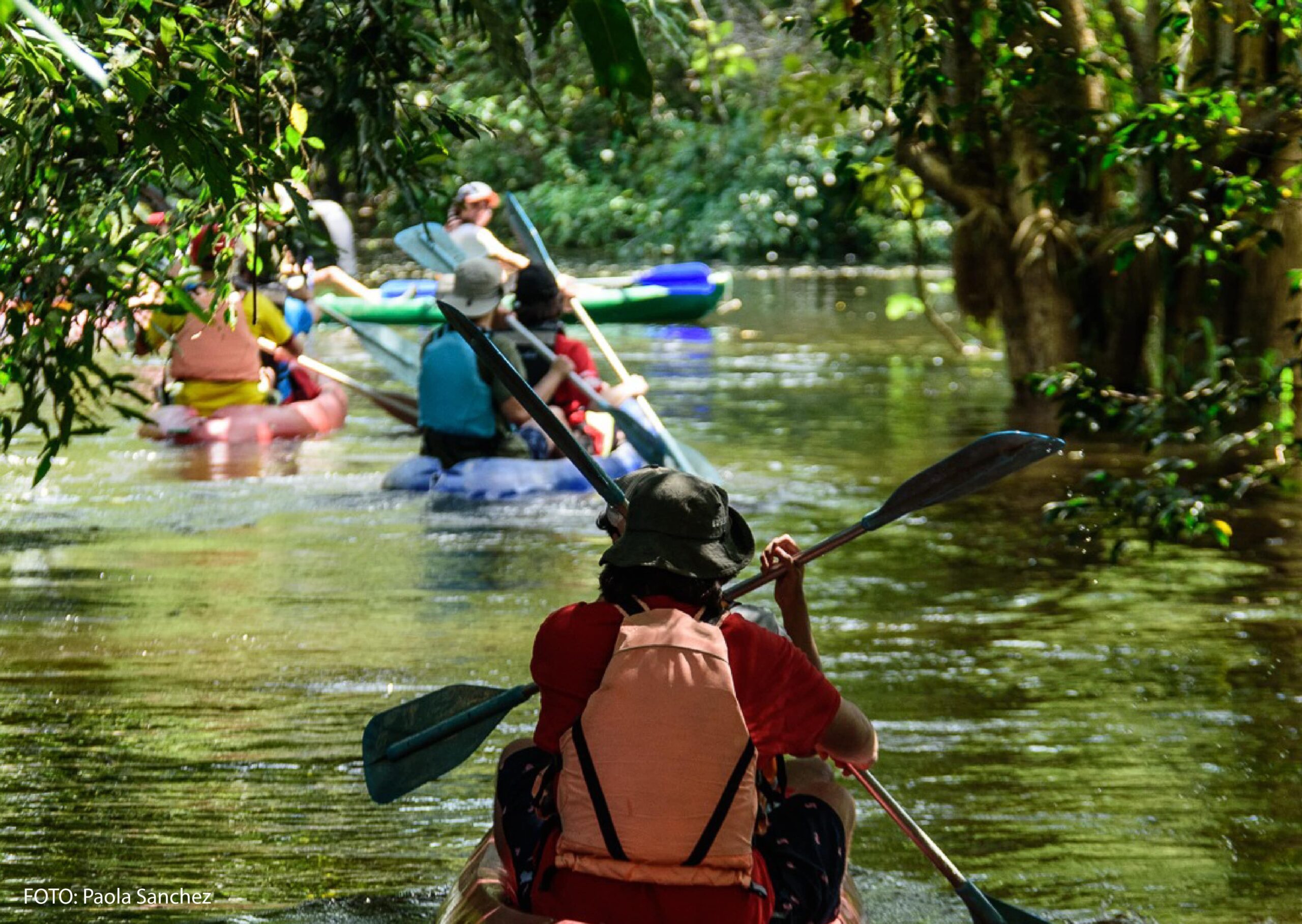 Tourists in a kayak tour in the amazon tour siempre colombia travel agency